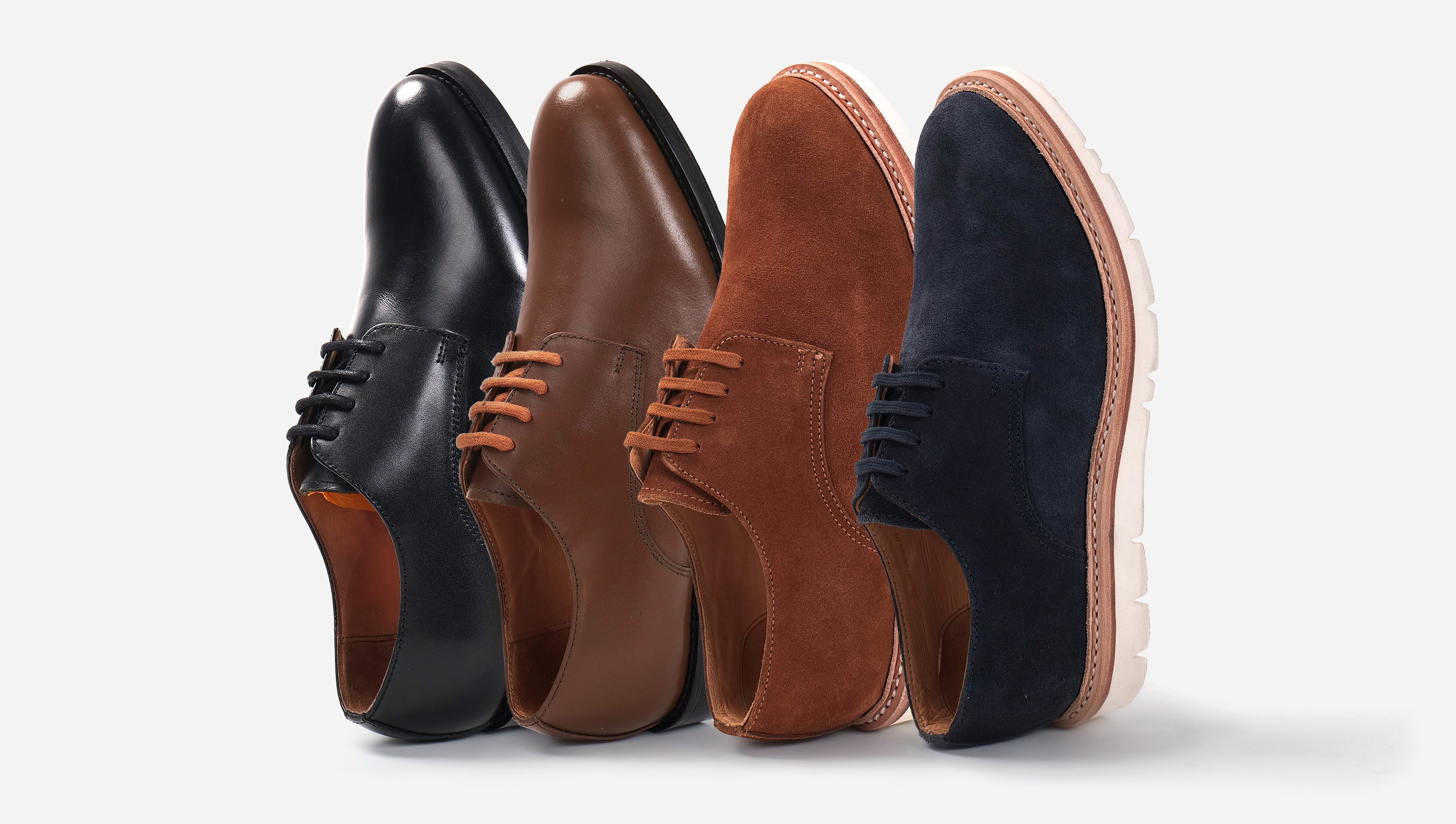 Four styles of handmade leather Blucher shoes displayed in a row